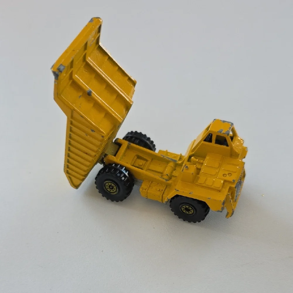 Hot Wheels 1979 CAT Yellow Dump Truck